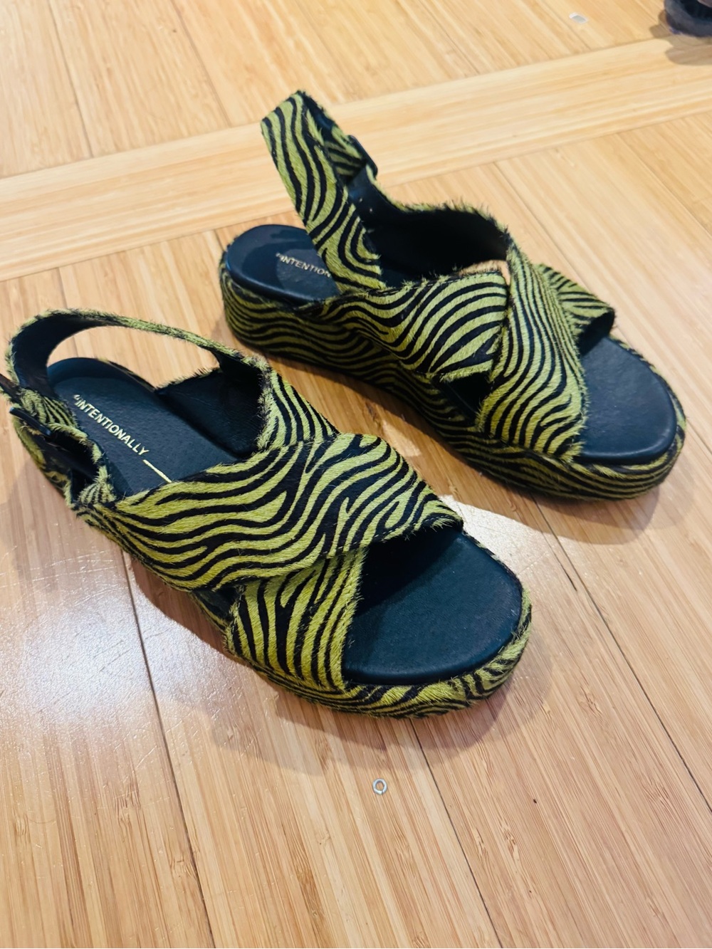 Intentionally blank animal print sandals